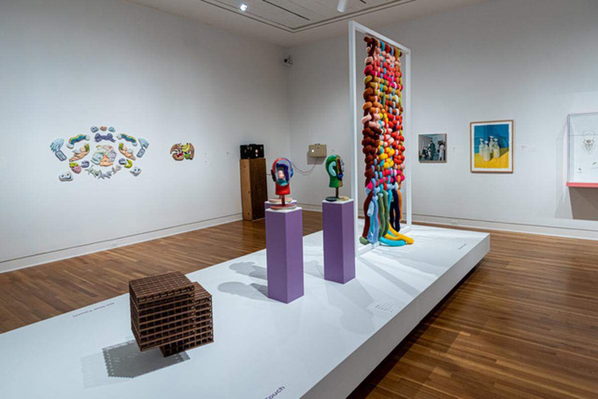 Works by artists from Charlotte’s Goodyear Arts collective, including co-founders Amy Herman and Amy Bagwell, are on view in the Jones Gallery at The Mint Museum as part of the ‘It Takes a Village’ exhibit.