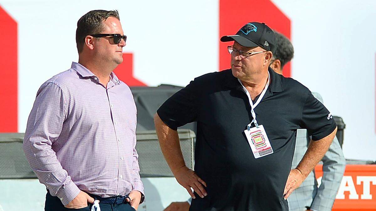 Carolina Panthers team owner David Tepper, right, speaks with general manager Scott Fitterer at Raymond James Stadium in Tampa, Fla., on Sunday, January 9, 2022. The Panthers later lost their season finale, 41-17, to the Tampa Bay Buccaneers to finish the season 5-12.