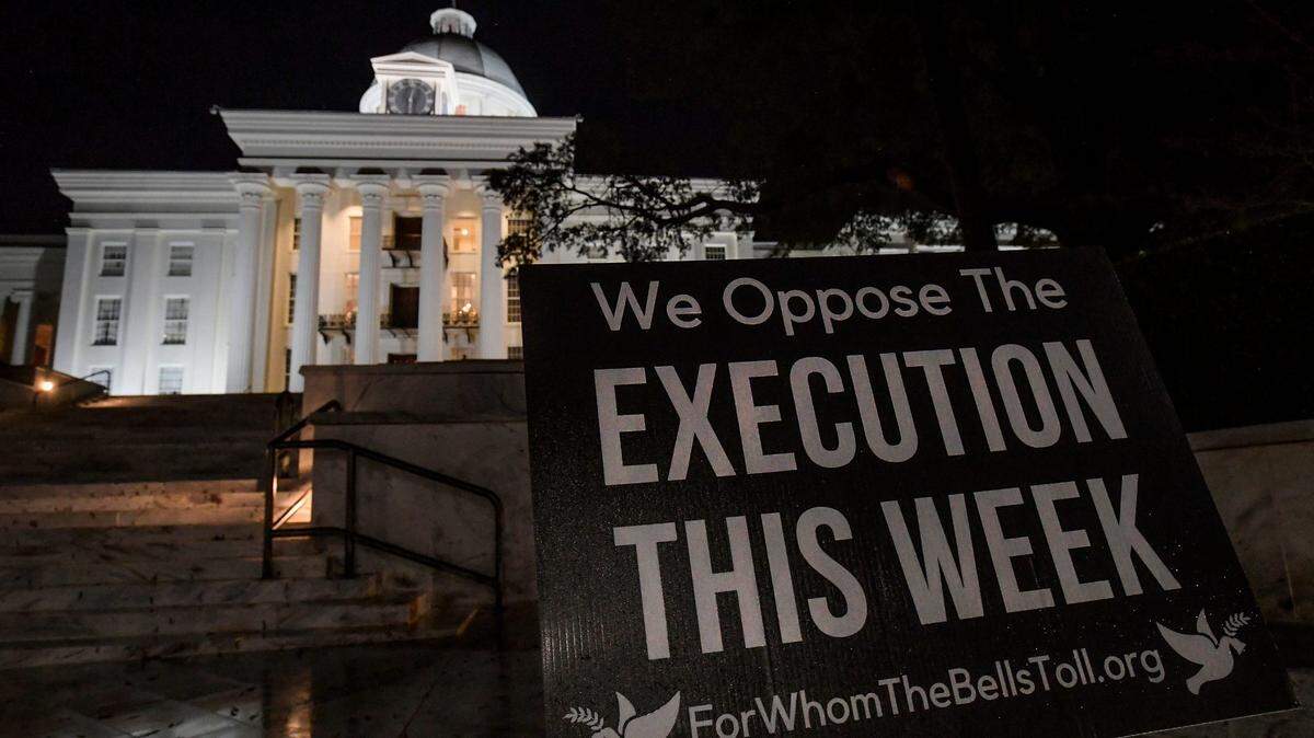 This sign stood in front of the Alabama State Capitol building in Montgomery on Jan. 25, 2024 as people waited to hear news of the planned execution of Kenneth Eugene Smith. Smith was executed that night as Alabama carried out the nation’s first execution using nitrogen gas.