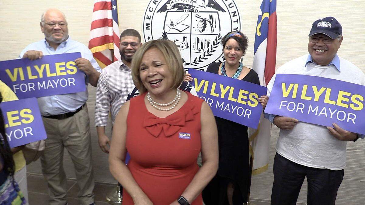 Mayor Vi Lyles speaks to the media after filing for re-election in July.