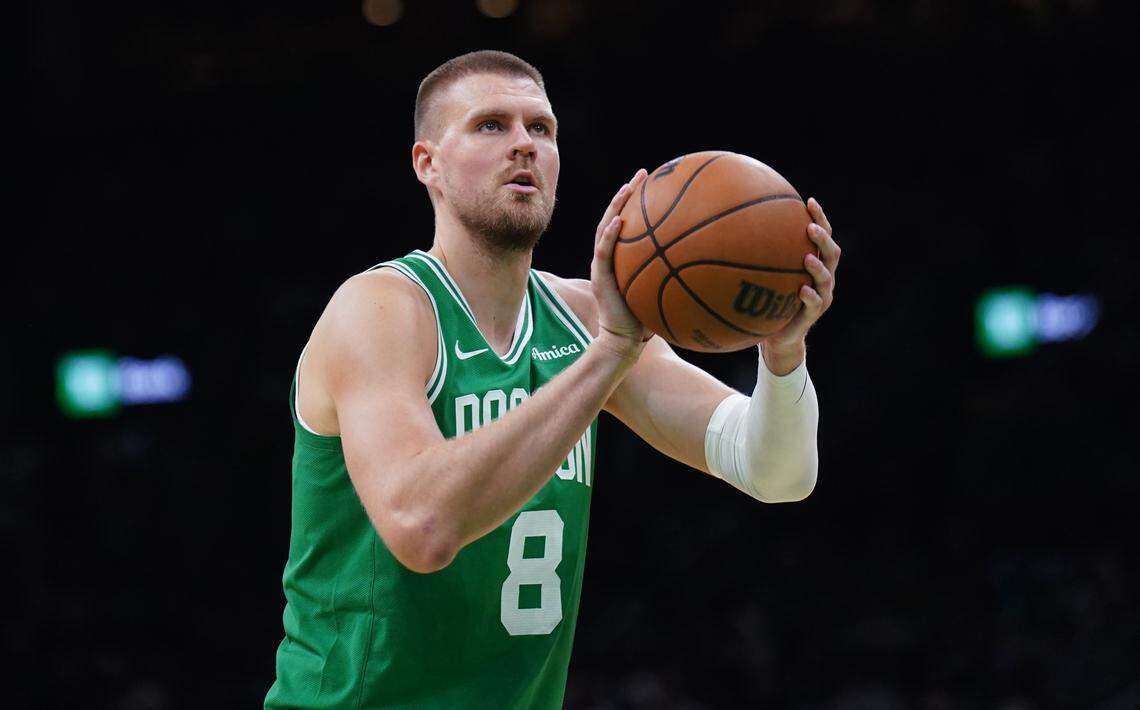 Boston Celtics center Kristaps Porzingis (8) shoots a free throw against the New York Knicks in the second half during game two of the second round for the 2025 NBA Playoffs at TD Garden.
