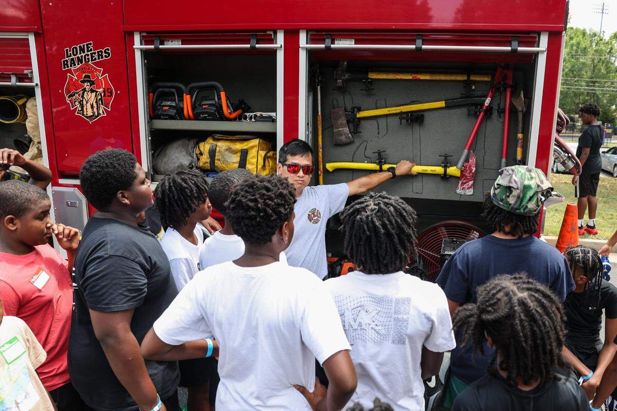 On Monday, July 21, 2025, during Impact Camp at Johnson C. Smith University in Charlotte, the junior varsity boys received a tour of a fire truck from Fire Station 36. Impact Camp, a week-long free camp, offers 300 spots and teaches young boys the importance of education, entrepreneurship, enlistment, employment, and the various positive paths in their lives.