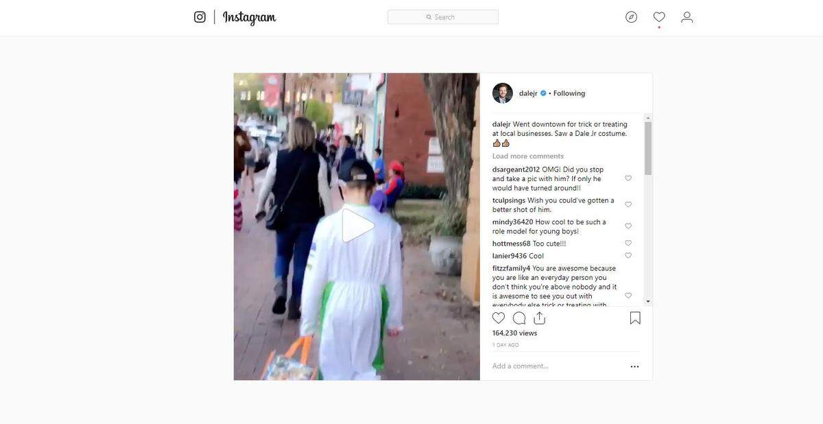 Retired NASCAR driver Dale Earnhardt Jr. spotted this boy dressed like Earnhardt the race car driver when Dale Jr. went trick-or-treating in downtown Mooresville with his wife, Amy, and their daughter, Isla Rose.