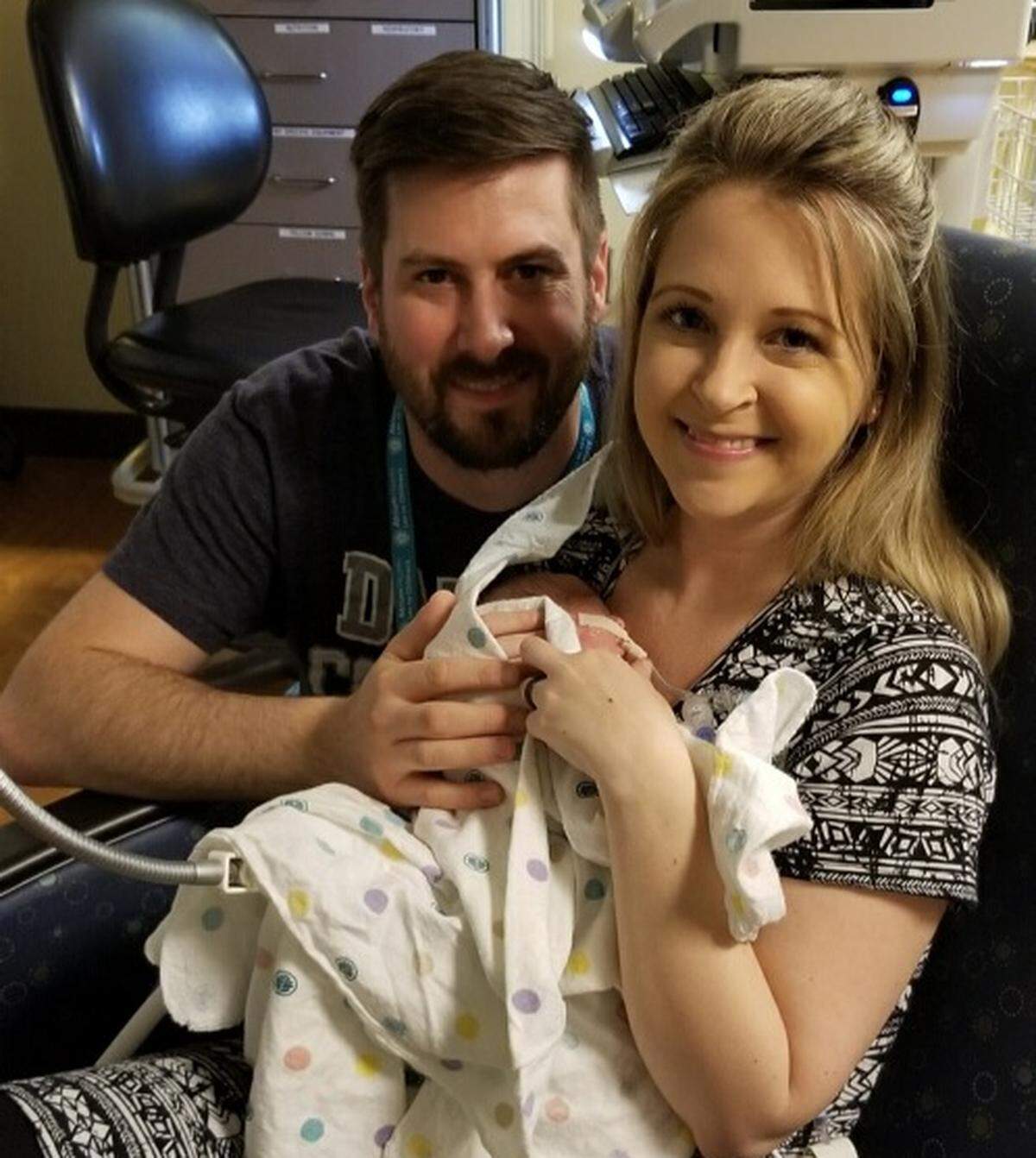 Neal and Stephanie Flower with Camille on her first Mother's Day, three weeks after Charlotte's passing.