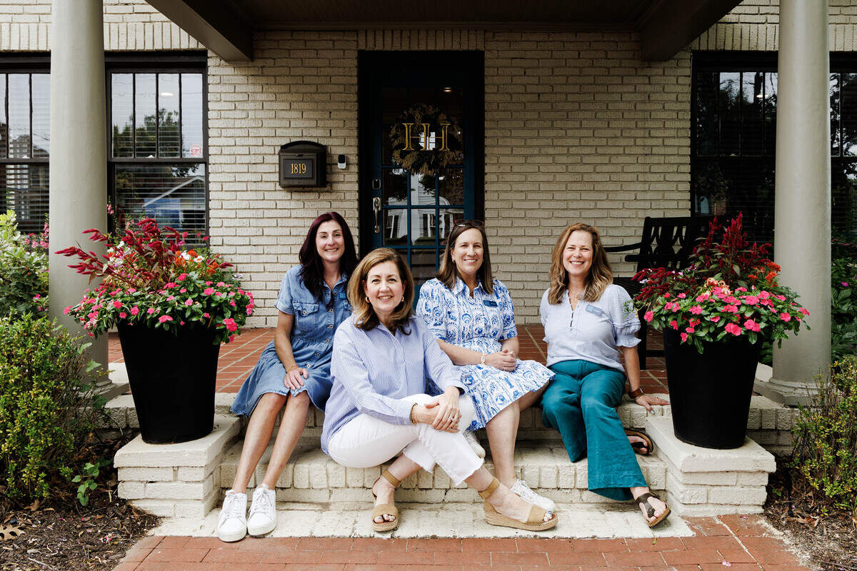 From left: General Manager Vanessa Maybury, founder Charolette Obringer, Instructor and guest experience lead Jennifer Engel and Instructor and guest experience associate Kerry Singe, a former Observer reporter, on the steps of Heron House Mahjong. “We have a fabulous team,” Obringer said. “We worked hard on this together.”