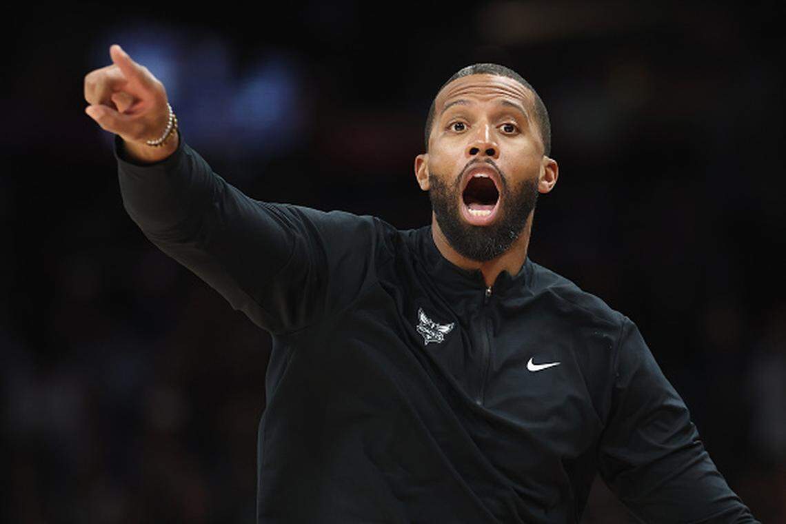 Head coach Charles Lee of the Charlotte Hornets reacts.