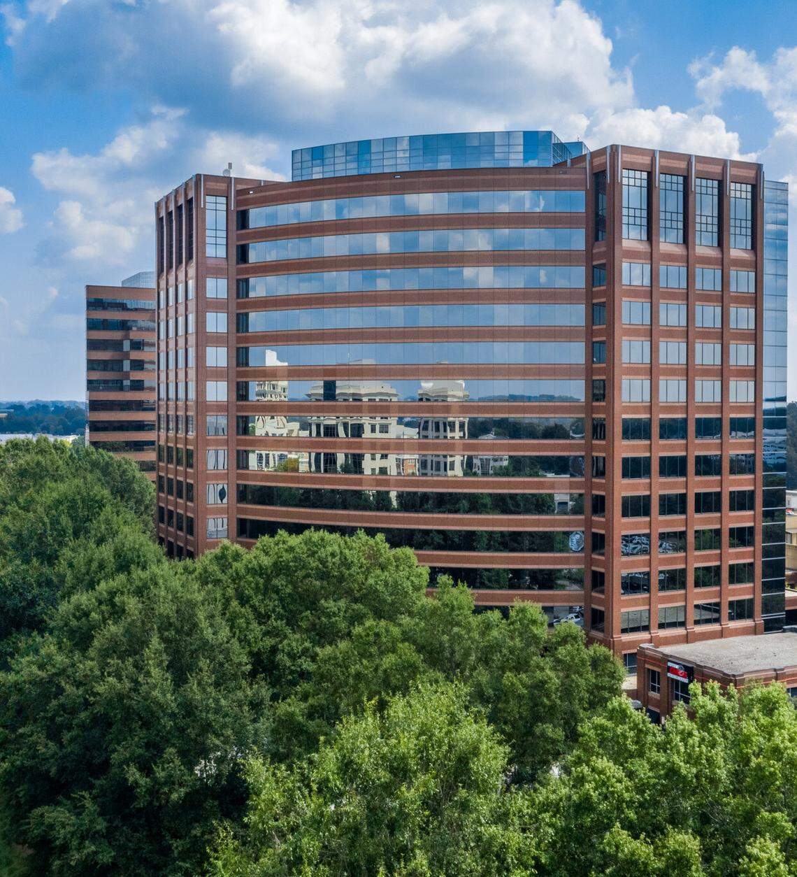 Crestlight Capital purchased SouthPark Towers earlier this month, including this building, at 6000 Fairview Road. The Detroit-based company is seeking to rezone the 10 acres the towers sit on to allow for a mixed-use development.