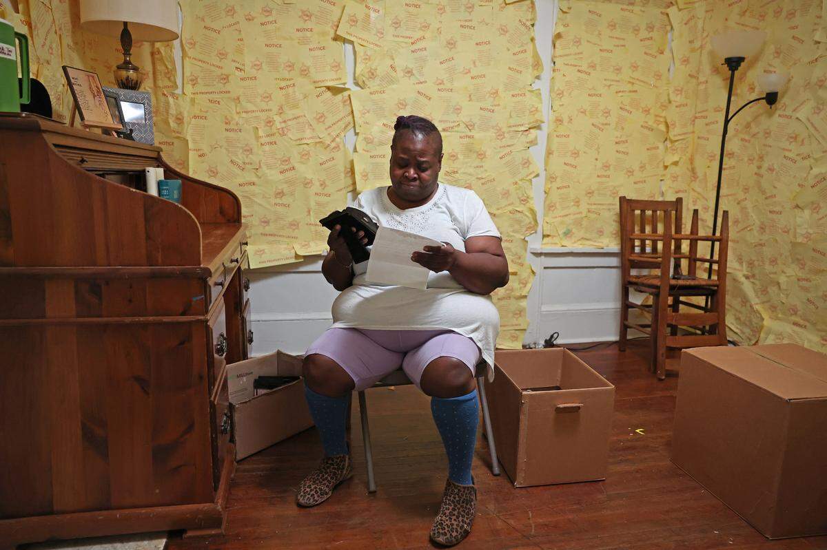 Sunnee Goodwin portrays a woman who has 90-days to vacate her home in an immersive play on gentrification. Goodwin joined others for a rehearsal on Tuesday, August 13, 2024 at the QC Family Tree’s Big Blue House in Charlotte, NC.