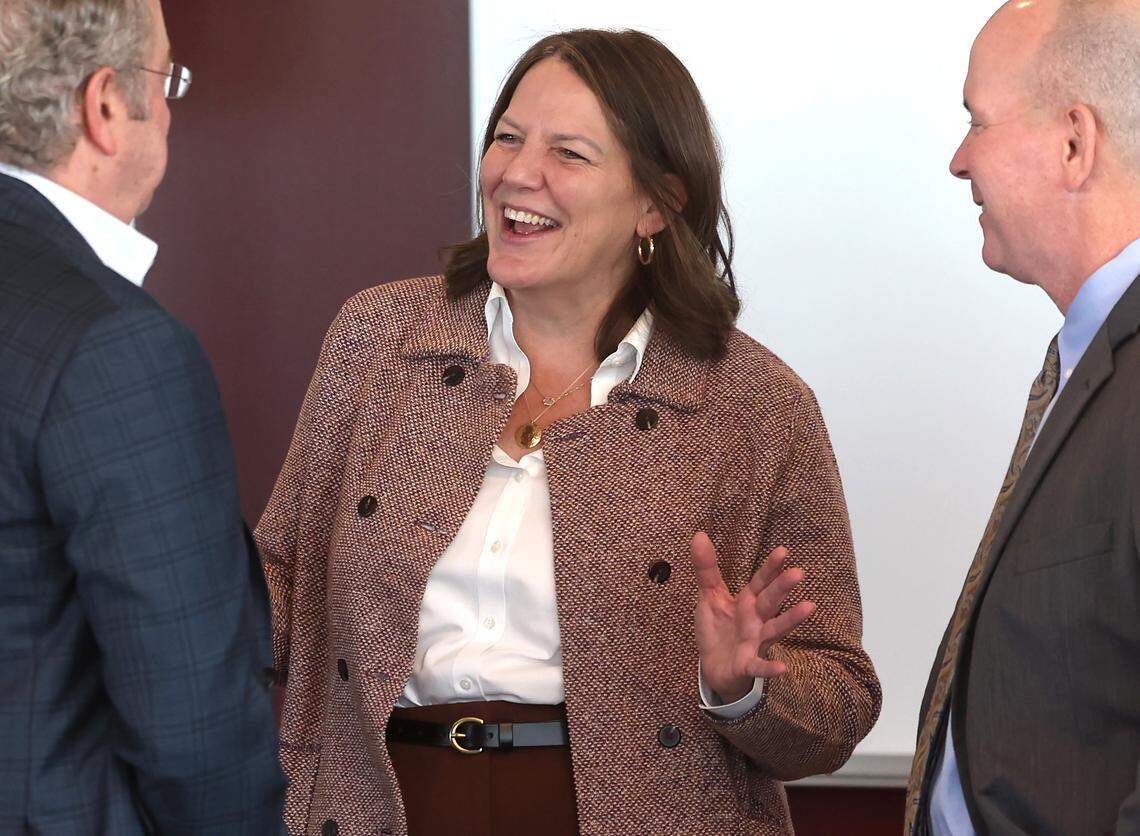 Elon University President Connie Book, center, speaks with attendees prior to the announcement that the university will be launching a full-time law program in Charlotte, NC in the fall of 2027 on Tuesday, January 13, 2026. The law program will be the city's first since Charlotte School of Law closed in 2017.