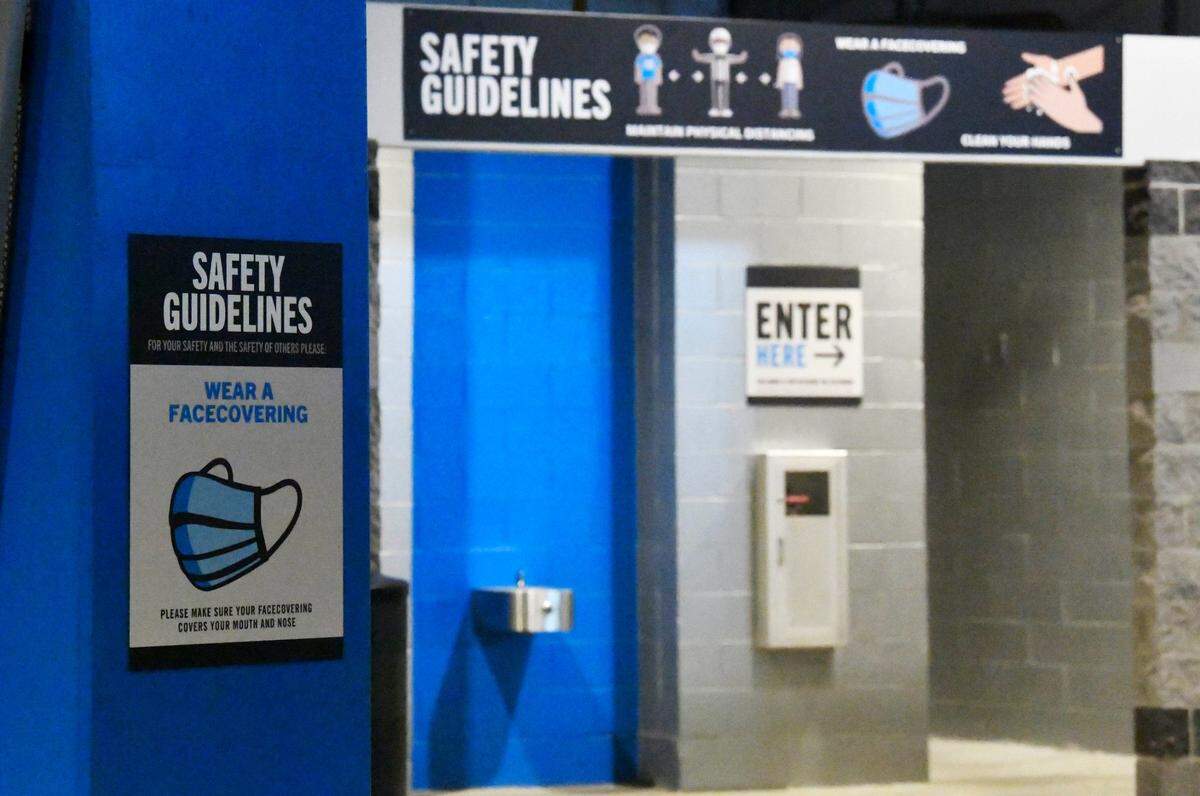 Social distancing and safety signs are displayed inside of Bank of America Stadium during Carolina Panthers training camp on Saturday, August 22, 2020.