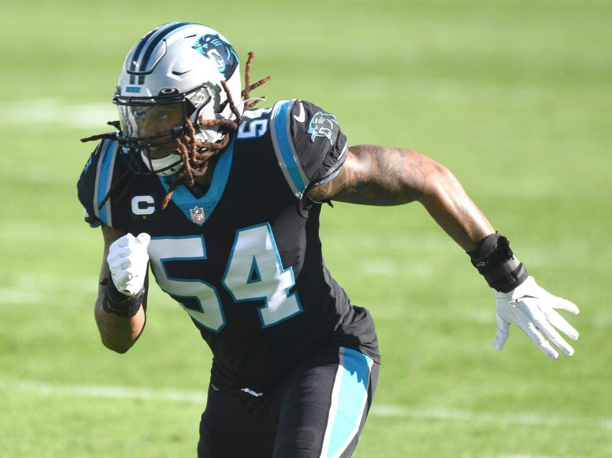 Carolina Panthers linebacker Shaq Thompson races toward the Denver Broncos backfield on Dec. 13, 2020. Thompson is the team’s representative in the Walter Payton Man of the Year Award.