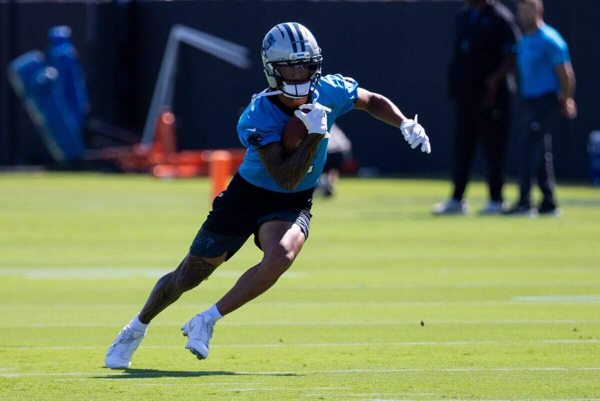 Jul 23, 2025; Charlotte, NC, USA; Carolina Panthers wide receiver Tetairoa McMillan (4) runs with the ball during Panthers Training Camp. Mandatory Credit: Scott Kinser-Imagn Images