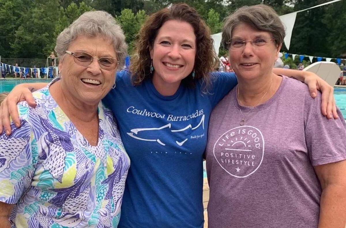 Coulwood Barracudas swim coach Betsy Mauney, center, with her aunts Sylvia Byrd, left, and Donna Kretschmer. For 60 years, the pool has brought generations out to enjoy community and connectivity.