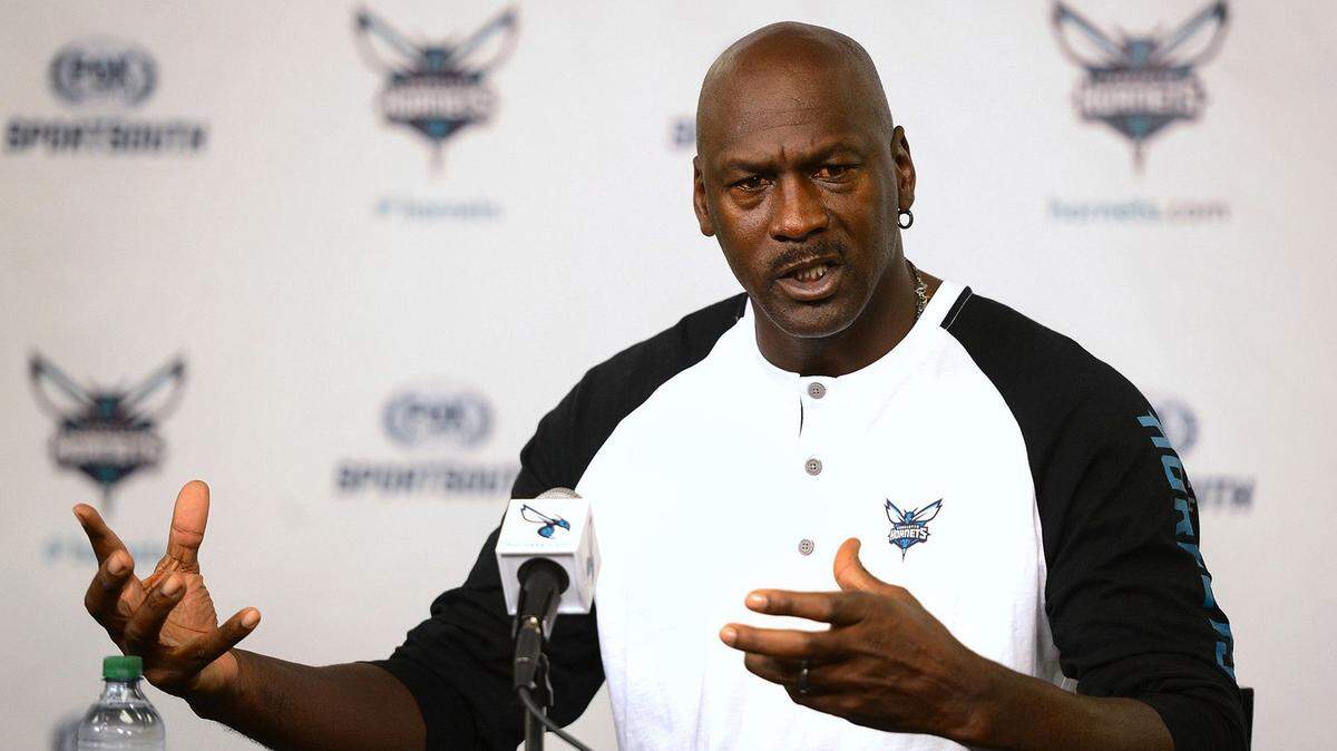 Charlotte Hornets owner Michael Jordan responds to a question during a news conference on Oct. 28, 2014, at Time Warner Cable Arena in Charlotte, North Carolina. (Jeff Siner/The Charlotte Observer/TNS)