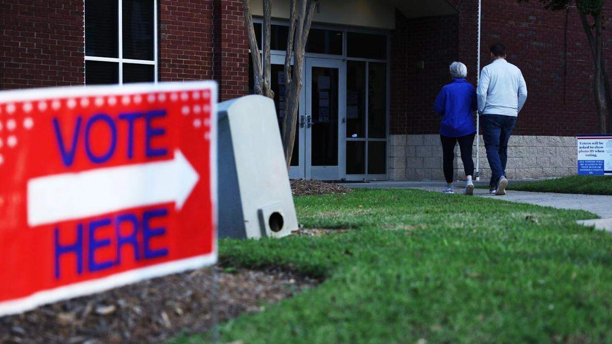 People walk into precinct #22 at Warren McKissick Mutipurpose Center to place their vote in the primary election in Charlotte, NC on Tuesday, September 9, 2025.