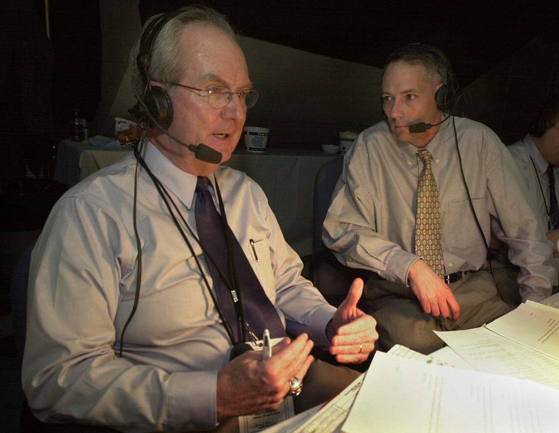 Mick Mixon (right) with Woody Durham on the call for Tar Heel Sports Network from their Smith Center broadcast booth just before tipoff of the UNC-Florida State game in 2001.