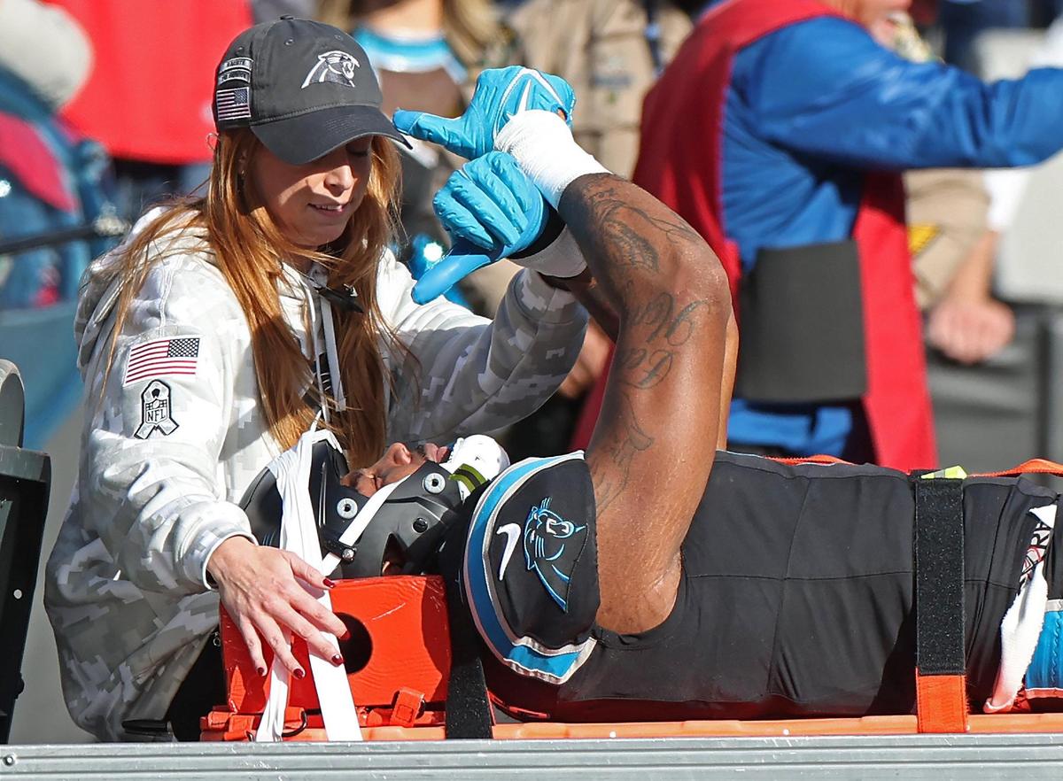 Carolina Panthers TE Ja’Tavion Sanders raises his arms as he is driven off the field at Bank of America Stadium in Charlotte, NC on Sunday, Nov. 24, 2024. Sanders was injured after catching a pass against the Kansas City Chiefs in late second-quarter action.