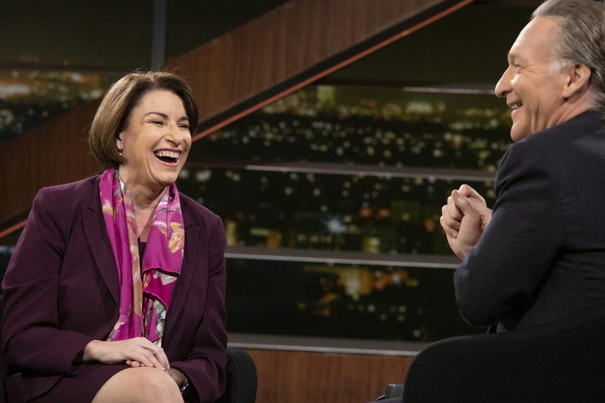 Bill Maher sits with Senator Amy Klobuchar during an episode of “Real Time” on HBO in 2020.