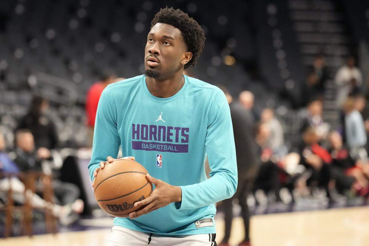 Apr 2, 2023; Charlotte, North Carolina, USA; (Editors Notes: Caption Correction) Charlotte Hornets center Mark Williams (5) takes a warm up shot during pregame warm ups against the Toronto Raptors at Spectrum Center. Mandatory Credit: Jim Dedmon-USA TODAY Sports