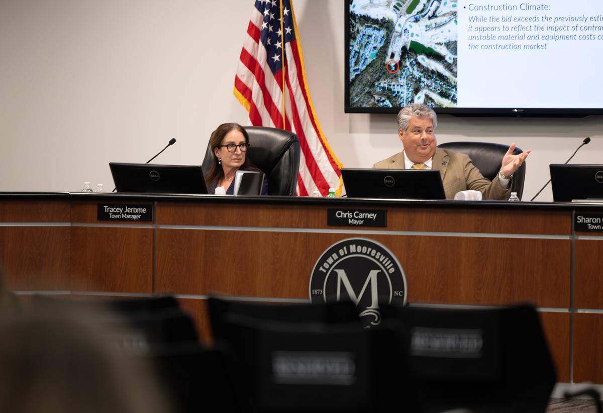 Mooresville Mayor Chris Carney speaks during a town council meeting in Mooresville on October 6.