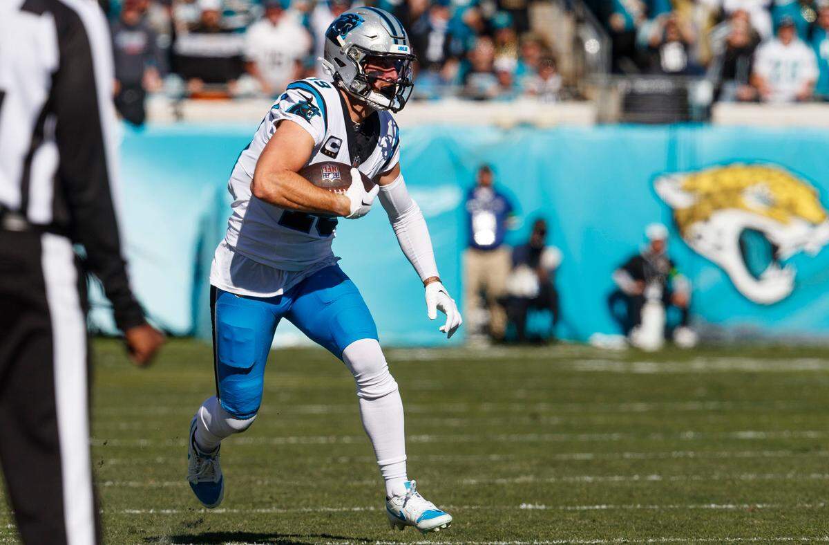 Carolina Panthers wide receiver Adam Thielen (19) runs the ball against the Jacksonville Jaguars during the first quarter at EverBank Stadium.