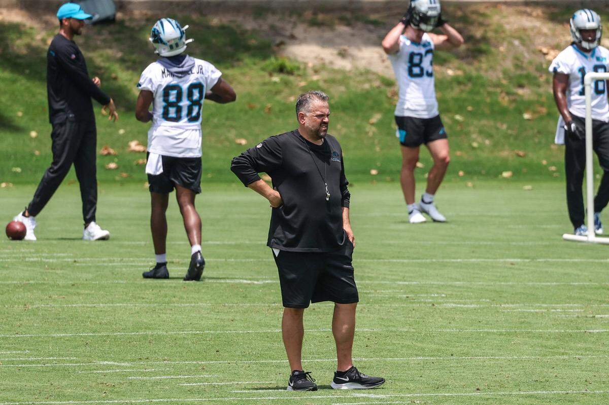 Panthers head coach Matt Rhule, center, watches practice during day two of mini camp on Wednesday, June 15, 2022 in Charlotte, NC.