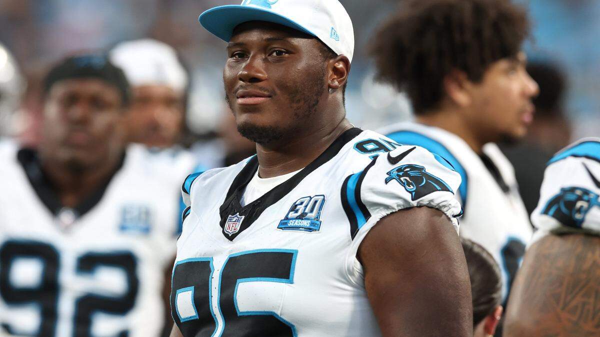 Carolina Panthers defensive end Derrick Brown stands along the team’s sideline during second quarter action against the New York Jets at Bank of America Stadium in Charlotte, NC on Saturday, August 17, 2024.