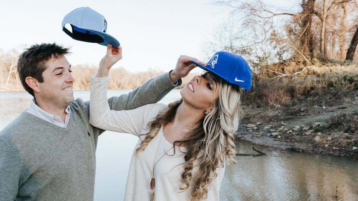 Duke fan Freddy Dixon and Carolina fan Kristin Dixon had some fun with their rivalry during their engagement photo session five years ago.