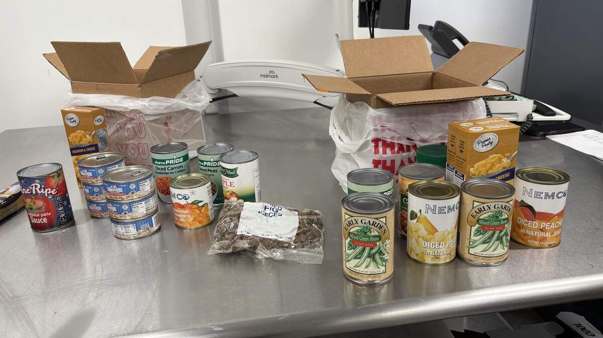 Food boxes for people in need during the pause in SNAP benefits due to the federal government shutdown contain protein, nonperishables and other items at the food pantry inside the Ella B. Scarborough Community Resource Center.