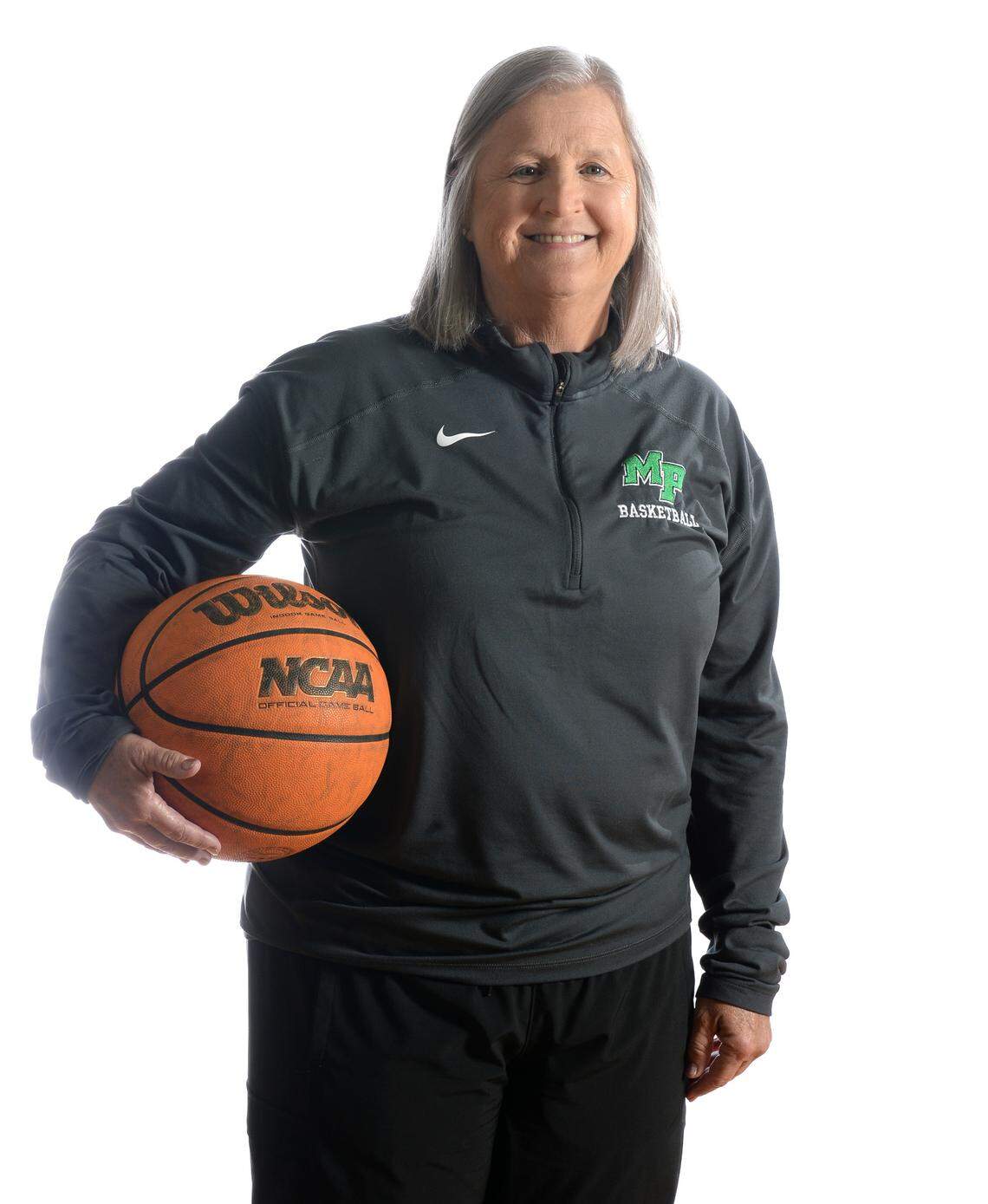 Myers Park girls head basketball coach Barbara Nelson on Tuesday, March 19, 2024. Nelson is the coach of the Sweet 16 era (1984-present).