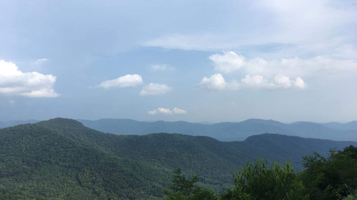 The 65-year-old Blue Ridge Parkway visitor died at the scene, officials said.