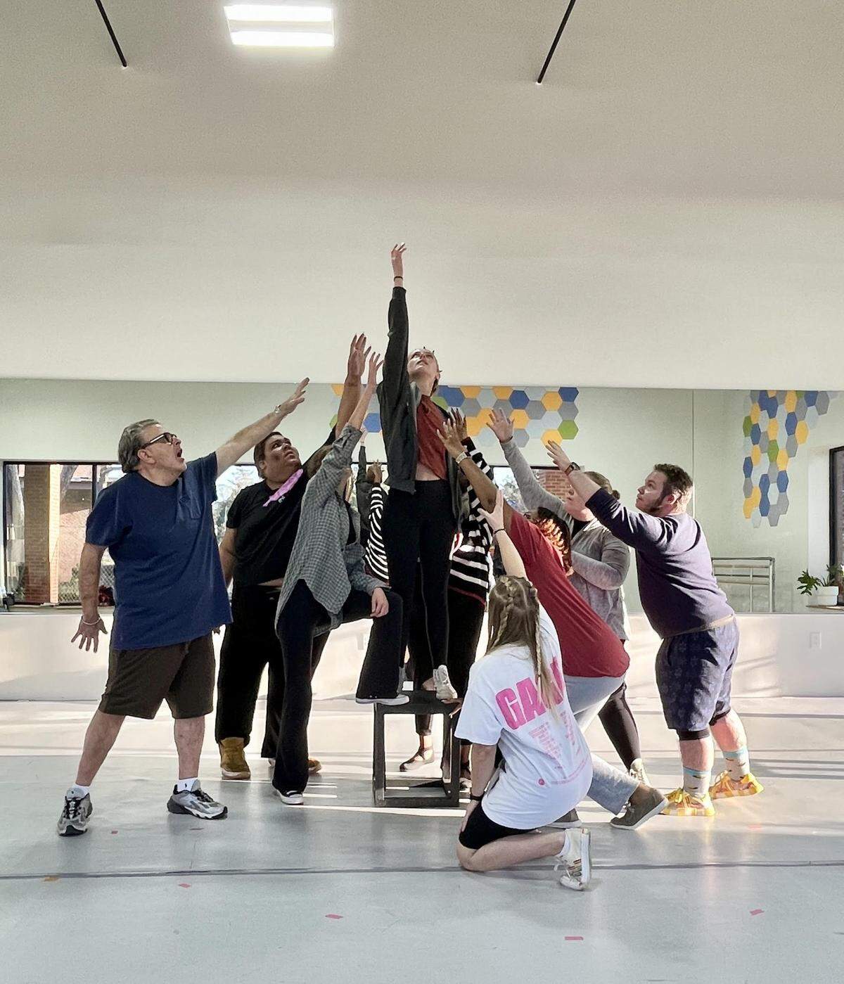 “Godspell” cast members rehearse for their upcoming performance for The Lotus Project.