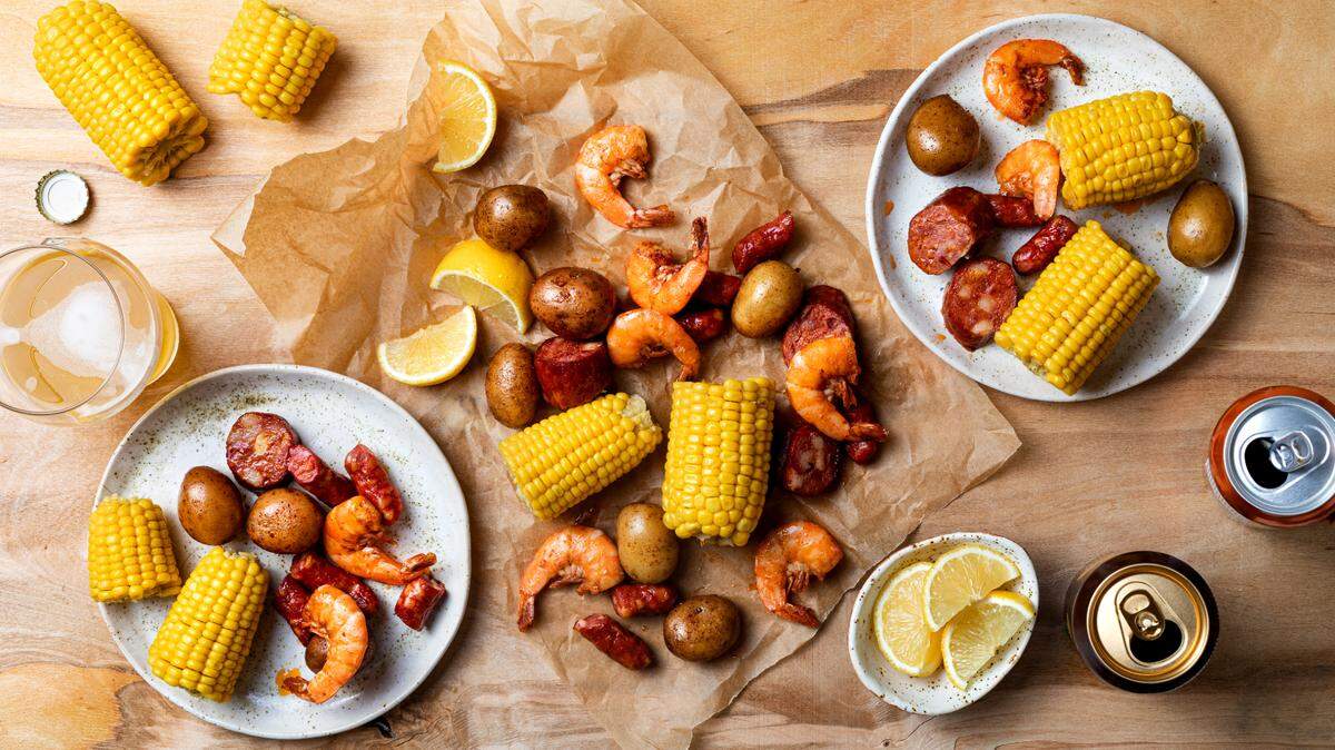 A Lowcountry boil is traditionally made with sausage, potato and corn.