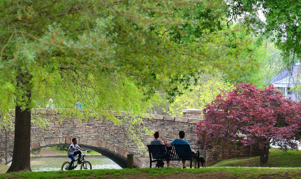 With the temperature in the low 80s, people enjoy the spring weather at Freedom Park in Charlotte, NC on Tuesday, April 7, 2020. 