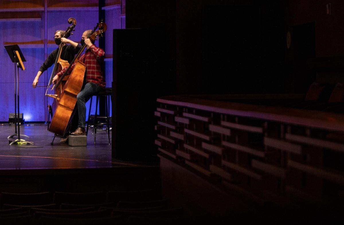 Jeffrey Ferdon, left, and Judson Baines play during an Oct. 8 Charlotte Symphony Orchestra rehearsal at Knight Theatre in uptown Charlotte.