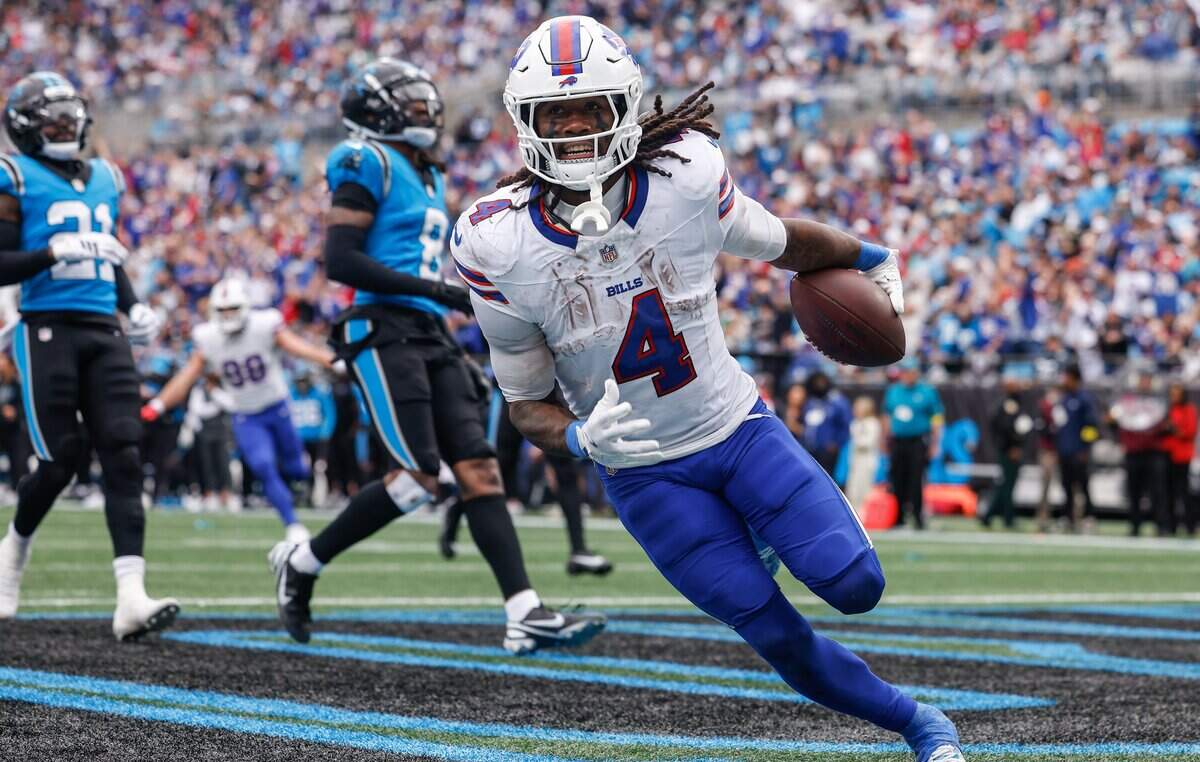 Bills runningback James Cook runs excitedly into the end zone for another touchdown during the game against the Panthers at Bank of America Stadium in Charlotte, NC on Sunday, October 26, 2025. The Bills handedly defeated the Panthers, 40-9.