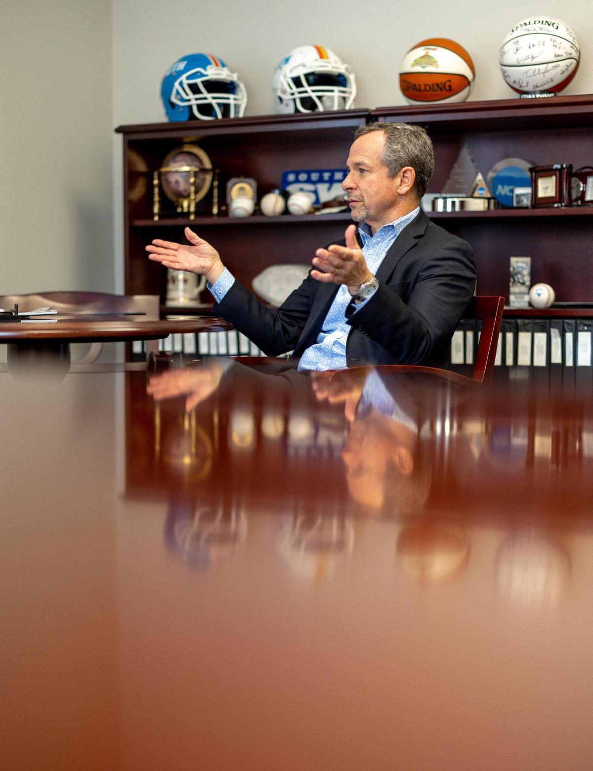 Kyle Kallander, the commissioner of the Big South Conference, talks with a reporter about different changes he would like to see after he leaves the position at the Big South Headquarters in Charlotte, NC on Friday, December 2, 2022.
