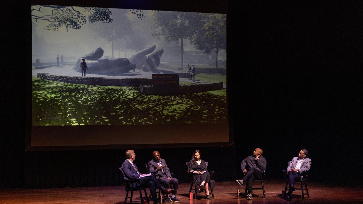 A panel speaks during the unveiling of plans for the commemoration memorial honoring enslaved workers who helped build the campus with a memorial, sculpture and plaza at Davidson college on Thursday, March 30, 2023.