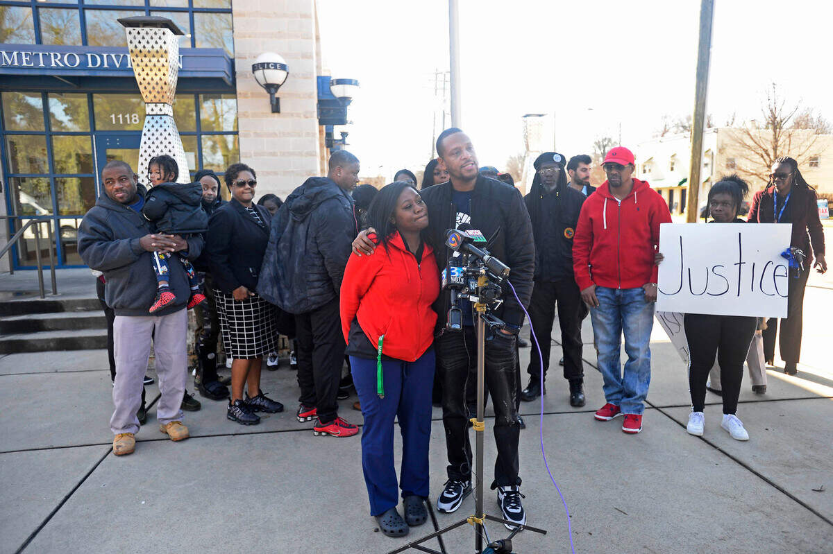 Gemini Boyd hugs Andrell Mackey, sister of Harold Easter, during a press conference in front of the Charlotte-Mecklenburg Police Department Metro Division on Jan. 28. Five CMPD officers involved in Easter's death may be fired, pending a vote by the Civil Service Board. Police Chief Johnny Jennings said Friday the officers follow policies the day Easter was arrested, swallowed cocaine and then collapsed inside a police interview room after his arrest.