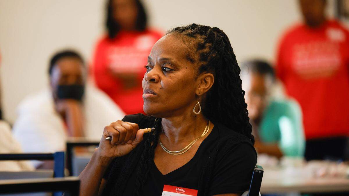 Glenda Bailey discusses how she copes with the loss of her son, Jaleel Nivens, during a gathering of Mothers Advocating for Real Change and Unwavering Support, a group for mothers who have lost a child to homicide, at Indian Trail Town Hall on May 15.