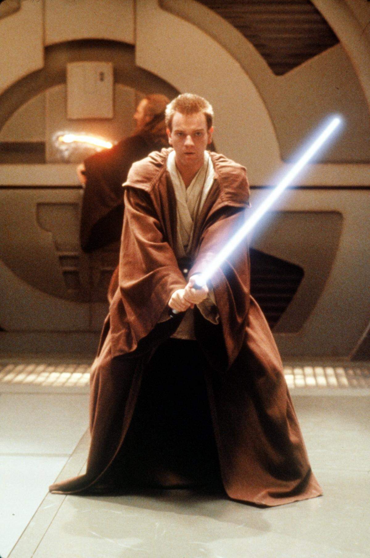 Ewan McGregor, seen here as apprentice Obi-Wan Kenobi cutting through the door to the bridge of a Trade Federation battleship in “Star Wars Episode 1,” is one of the stars of a new independent feature filming in Charlotte this fall.