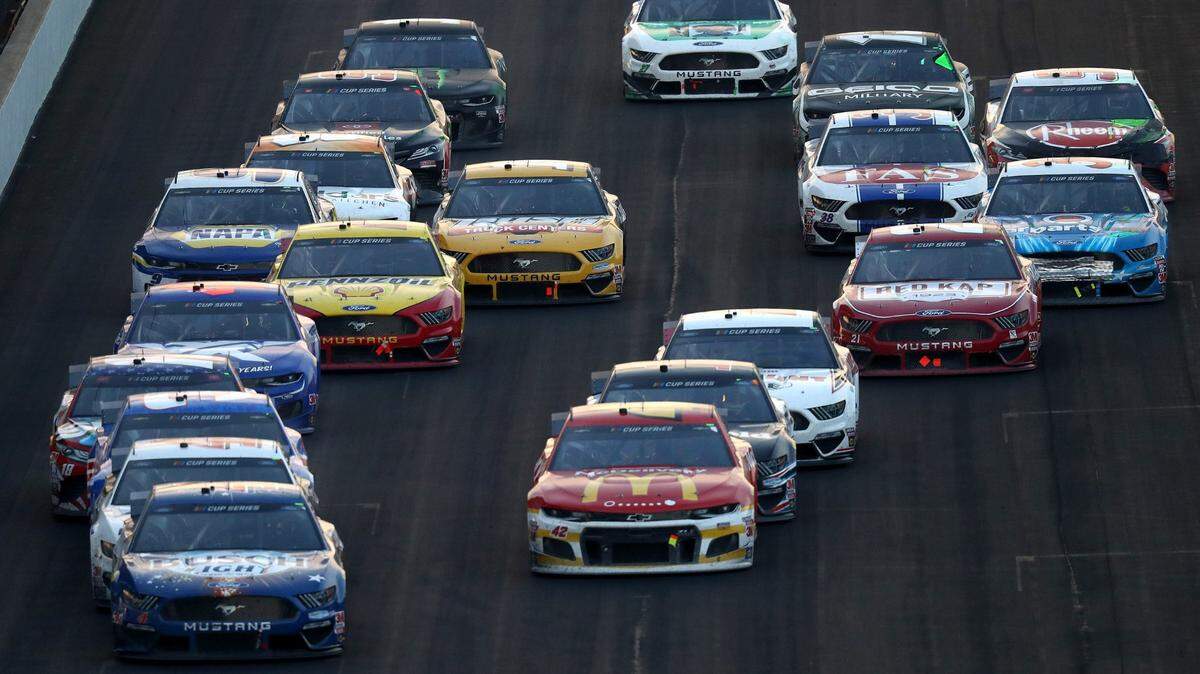 Kevin Harvick leads the field on the final restart of the NASCAR Cup Series Big Machine Hand Sanitizer 400 Powered by Big Machine Records at Indianapolis Motor Speedway on July 5, 2020, in Indianapolis. (Jamie Squire/Getty Images/TNS)