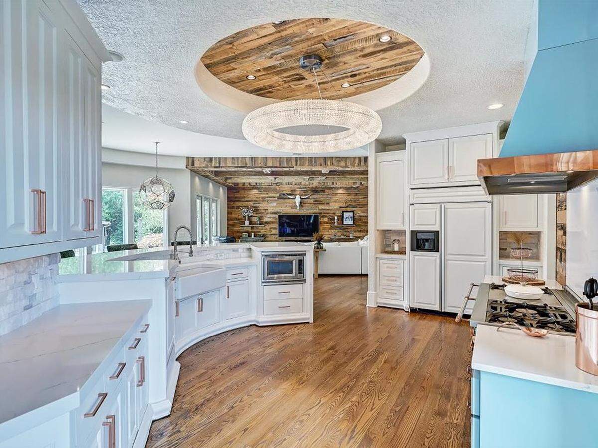 An interior kitchen is pictured in the 9,986-square-foot mansion at 355 Pelham Lane in Rowan County near Mooresville.