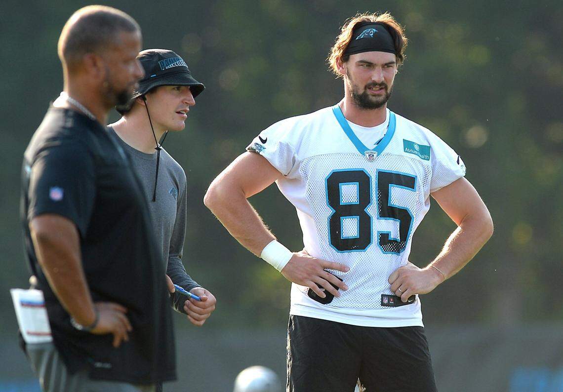 Carolina Panthers tight end Dan Arnold, right, watches teammates run through a drill during practice July 29 at Wofford College in Spartanburg, SC.
