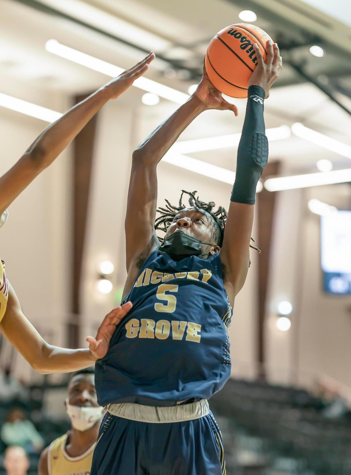 Hickory Grove’s Chas Stinson (5) drives to the basket at the Phenom Holiday Classic Wednesday December 23, 2020.