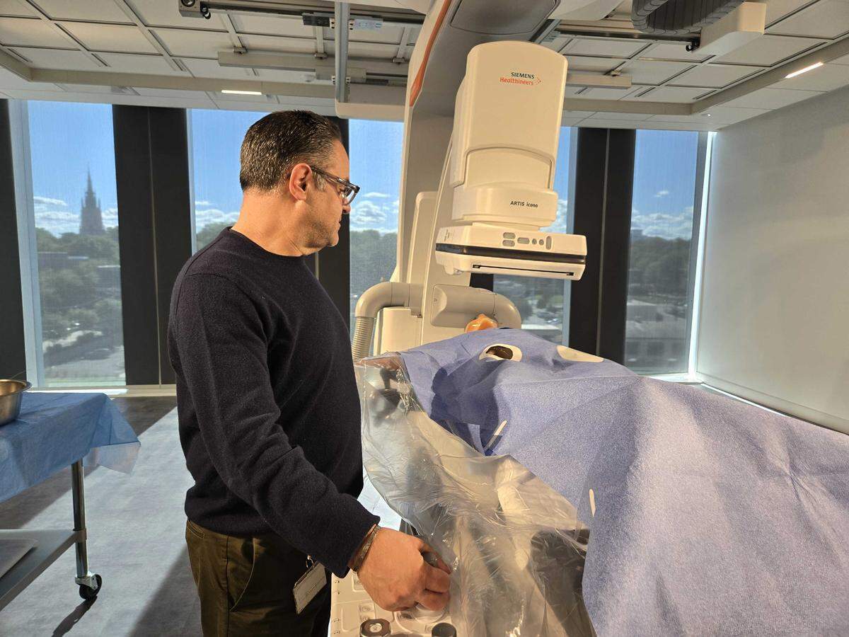 Siemens senior vice president Manny Niebla displays technology which captures internal body images. The company is one of several medical businesses at The Pearl, a $1.5 billion mixed-use development with retail, offices, apartments, and academic spaces.