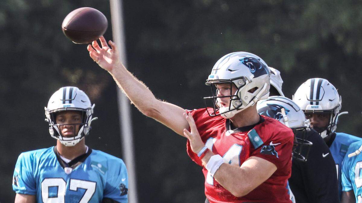 Carolina Panthers Sam Darnold passes the ball during a drill during day 5 of the Carolina Panthers training camp at Wofford College in Spartanburg, S.C., on Monday, August 2, 2021.