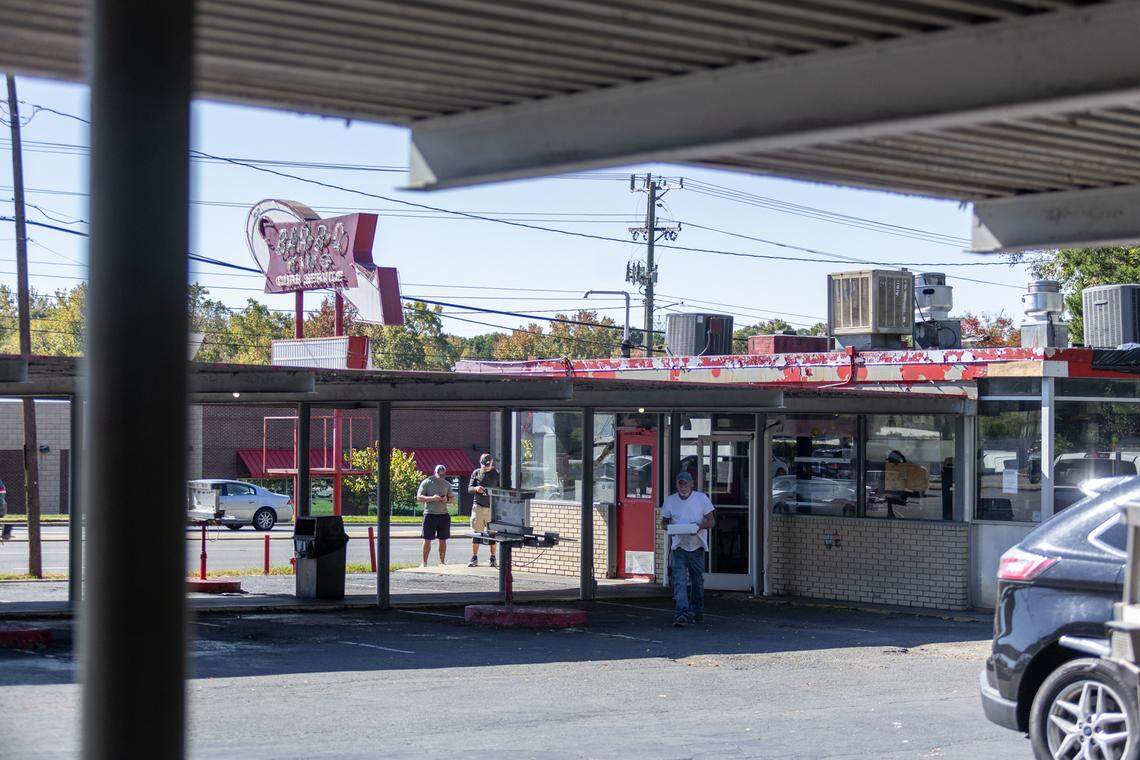 Cars pull up to the stalls to order at Bar-B-Q King on Wilkinson Boulevard in Charlotte.