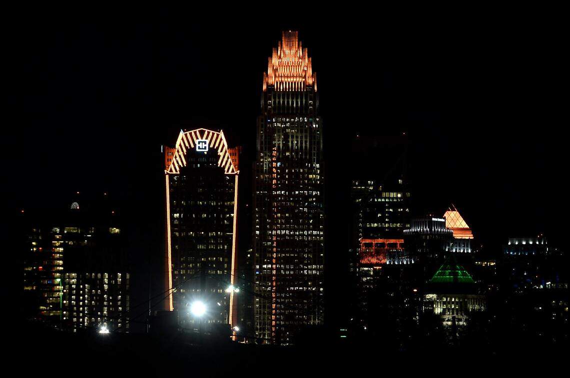 Buildings in Charlotte lit up on Jan. 19, 2021 for the national memorial to those who have died from COVID-19.