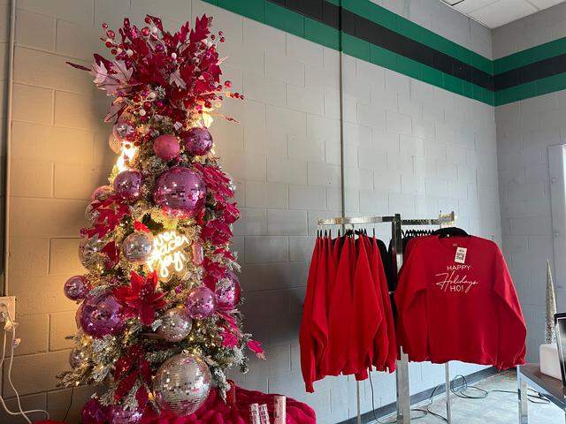 Holiday House is a new Christmas pop-up retail store and photo studio in East Charlotte. It includes a small selection of holiday apparel.